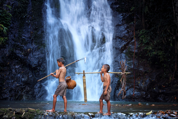 two-boy-play-laugh-fishing-waterfall_28914-39