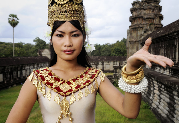 Beautiful young dancer posing outdoors.